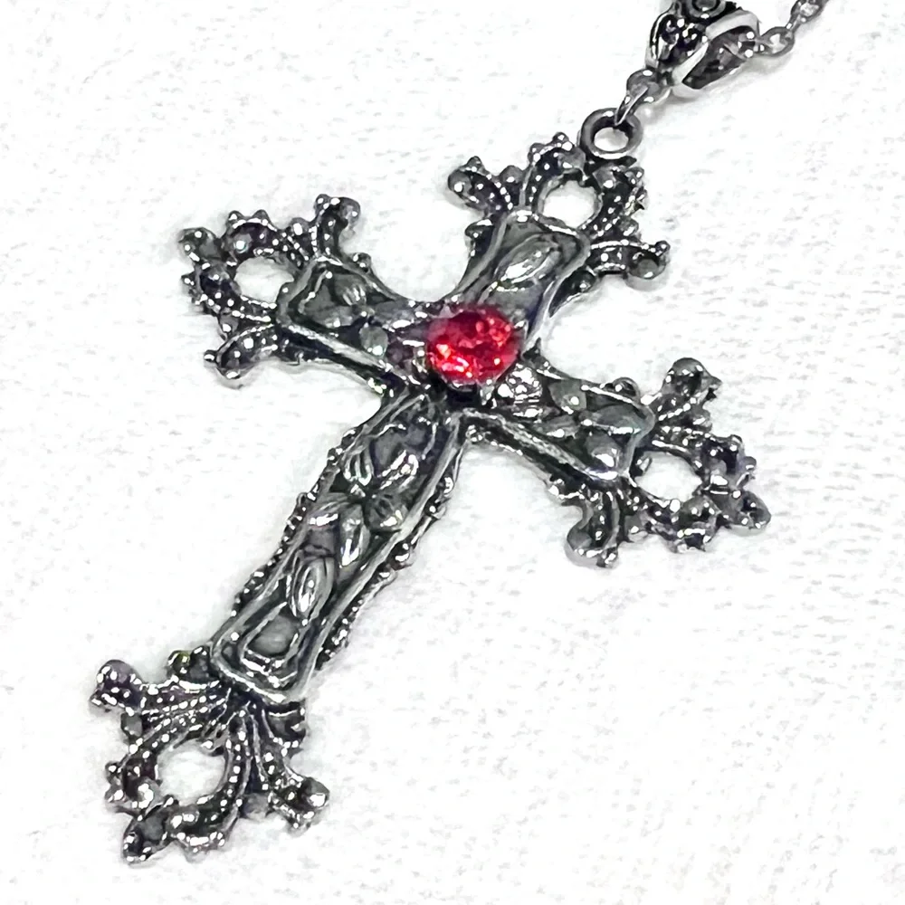 Silver Toned Cross Pendant with Red Gemstone